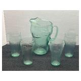 Coca-Cola drink set that includes pitcher, and four matching glasses. See pictures for details.