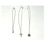 Heart pendant necklace, cross pendant necklace, and faux pearl teardrop necklace