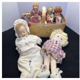 Woven basket of vintage collectible dolls, see pictures or details.