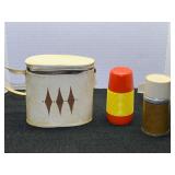 Vintage Aladdin thermoses with carrying case, see pictures for details.