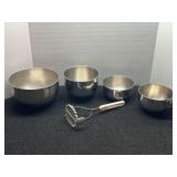 Stainless steel mixing bowls, also include a potato masher, see pictures for details.