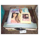 Collection of Vinyl Records and 8-Track Tape
