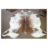 Brown and White Cowhide Rug