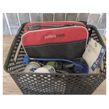 SMALL BASKET FILLED WITH AUTOMOTIVE ACCESSORIES INCLUDING “JUSTINCASE,” FREON, SPEAKER WIRE, AND MORE