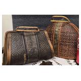 2 - Vintage Woven Bamboo and Wooden Handbags Featuring Decorative Metallic Panels and Textured Handles.