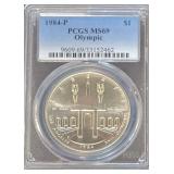 1984-S PCGS MS69 U.S.A. Los Angeles Olympiad Coliseum Silver Dollar. .90%Ag.ONLY 116, 675 Minted.  Grading Slab has Some Scuffing on the Reverse, but Coin is Unaffected.