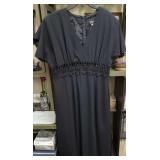 Size 10 Black Datia Dress Featuring an Intricate Lace Trim Along the Waist.
