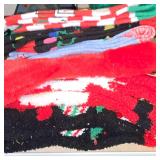 7 Pair Cozy Holiday Fuzzy Slipper Socks Feature Festive Red and White Seasonal Patterns.