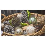 This Rustic Wicker Basket is Filled with a Charming Assortment of Frosted Pinecones, Woven Twig Spheres, and Blown Glass Leaf Ornaments.