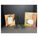 Decorative picture frames, two pieces, also comes with display stand. See pictures for details.