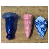 Ceramic and blown glass wall pockets, see pictures for details.