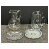 Two glass pitchers, also includes 5-salad/lunch plates, believed to be vintage Arcoroc USA. See pictures for details.