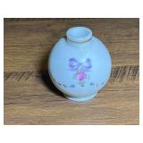Hand-painted milk glass perfume or cologne bottle with a pink rose and purple ribbon motif, believed to be vintage Westmoreland glass. See pictures for details.