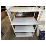 Shelving unit, four shelves. Great for kids room, see pictures for details.