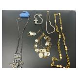 Assorted Fashion Necklaces Lot featuring Gold-Tone, Silver-Tone, Pearl-Accented, and Shell Disc Styles