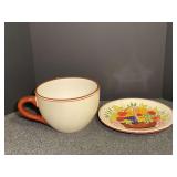 Ceramic Giant Teacup Planter with Matching Saucer and Hand-Painted Fruit Motif. CUP RIM HAS A CHIP