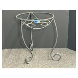 Decorative metal plant stand, see pictures for details.