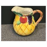 Vintage Gourmet Home Accents Ceramic Pitcher with embossed fruit motif, see pictures for details.