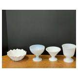Milk glass assortment to include a pedestal planter, compote, sunflower bowl, and more. Four pieces total, see pictures for details.