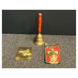 Brass bell with wooden handle, clapper is missing, brass door knocker, and more. See pictures for details.