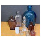 Assorted Glass Bottles and Jars Collection Including Blue Historical Flask and Specialty Containers