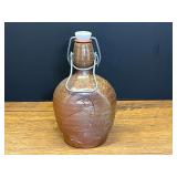 LR…Vintage artisan brown stoneware jug or flask with an incised bird design and a wire-bale swing-top stopper, see pictures for details.