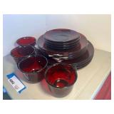 Garage…Vintage ruby red glass dinnerware set, from Arcoroc France, includes dinner plates, bread/salad plates, and cups and saucers. Approximately 20 pieces, see pictures for details.