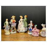 LR… Lovely vintage figurines, includes Royal Doulton, Lipper & Mann, one made in occupied Japan, one plays music, and more. Six pieces total, see pictures for details.