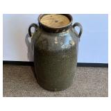 Garage… Vintage/antique double handled storage jar, this primitive double-handled stoneware crock features a rich, mottled dark glaze characteristic of traditional Southern folk pottery, see picture
