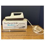 Garage… Moulinex electric knife, comes in original box, powers up, see pictures for details.