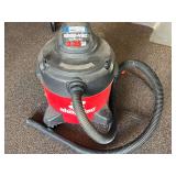 Garage… 8 gallon shop vac, powers up, see pictures for details.