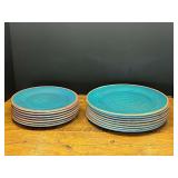 Garage… Turquoise colored melamine swirl plates. Approximately 15 pieces, see pictures for details.