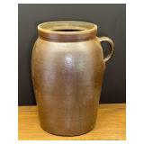 Garage…Vintage/antique brown-glazed 2 gallon stoneware pottery crock or churn with a side handle. See pictures for details.