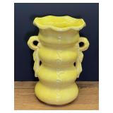 LR…Vintage 1950s McCoy pottery yellow vase with a distinctive embossed vine running down the center. See pictures for details.