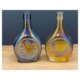 Bath…Vintage commemorative glass decanter bottles, set of two, produced by Wheaton Industries during the 1970s as part of their collectible historical and space-themed series.