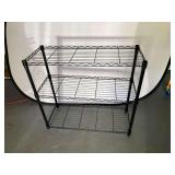 Garage… Three shelf wire shelving unit, stackable, see pictures for details.