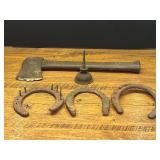 Garage… Vintage splitting ax, small appliance oil can, and horseshoes. See pictures for details.
