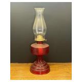 Garage… Red glass hurricane oil lamp, see pictures for details.