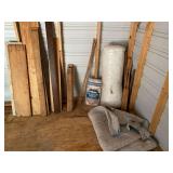SHED...All miscellaneous items in corner of shed to include full bag of popcorn pellets for packing, moving blanket, and miscellaneous wood pieces