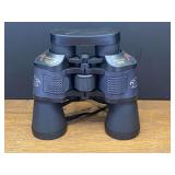 Garage…Black 60x60 power coated optics binoculars featuring an eagle logo emblem on the grip. See pictures for details.