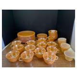 Garage…Fire-King Peach Luster "Laurel Leaf" glass dinnerware, includes dinner plates, berry bowls, cups, saucers, ramekins, and creamer. Approximately 50+ pieces, see pictures for details.