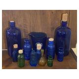 LR...Cobalt Blue and Assorted Colored Glass Bottles and Pitcher Collection