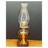 Garage…Vintage amber glass kerosene oil lamp with a double bulb base, see pictures for details.