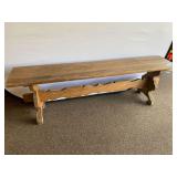 Garage… Vintage wooden trestle-style bench  with a scalloped, carved central stretcher and scrolled end supports. See pictures for details.