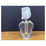 Garage…Faceted clear crystal decorative perfume bottle topped with a raw quartz or geode crystal stopper, see pictures for details.