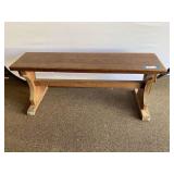 Garage… Wooden trestle style bench, see pictures for details.
