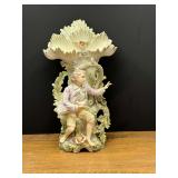 Bath…Vintage Ardalt figural porcelain spill vase with a seated youth figure holding a bird beneath a large, scalloped floral rim. see pictures for details.