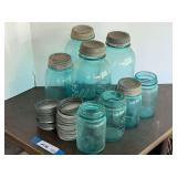 Garage… Assortment of vintage/antique blue canning jars with lids, see pictures for details.