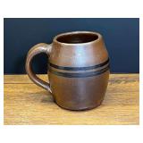 LR… Signed brown glazed ceramic mug with a rounded body, a loop handle. See pictures for details.