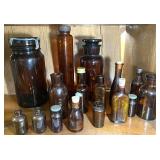 LR...Collectible Amber Glass Bottles and Jars in Various Sizes